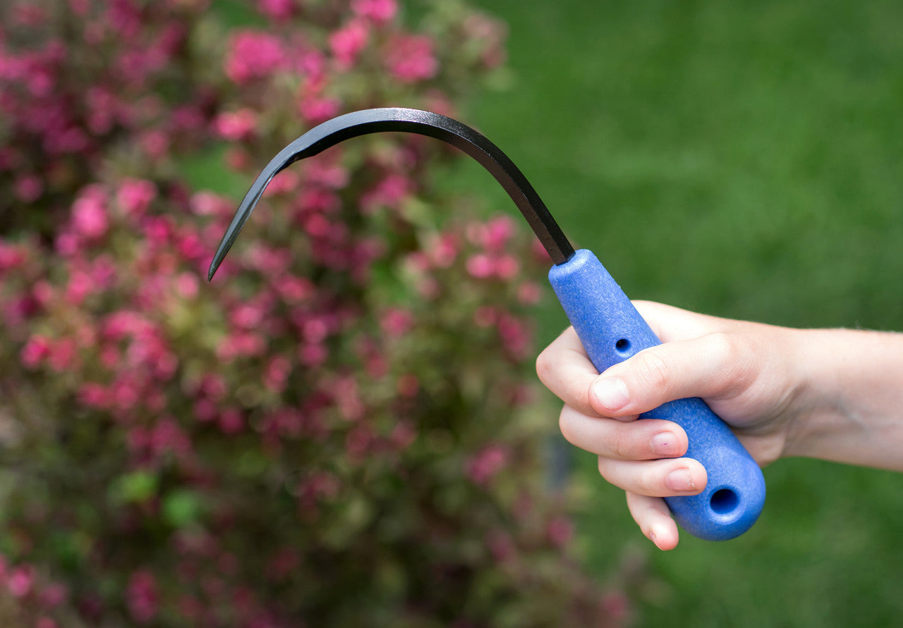 CobraHead Mini Weeder and Cultivator garden tool with ergonomic handle, ideal for weeding and cultivating garden soil.