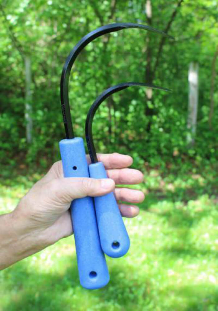 CobraHead Mini Weeder and Cultivator garden tool with ergonomic handle and steel tines for planting and weed removal.
