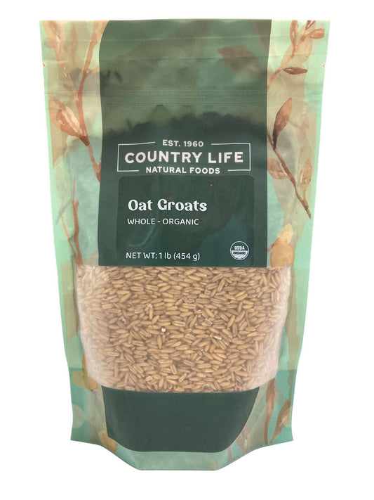 A 1 lb (454 g) stand-up pouch of Country Life Natural Foods Oat Groats, Whole, Organic features leafy green packaging and is labeled whole grain, organic, and high fiber.