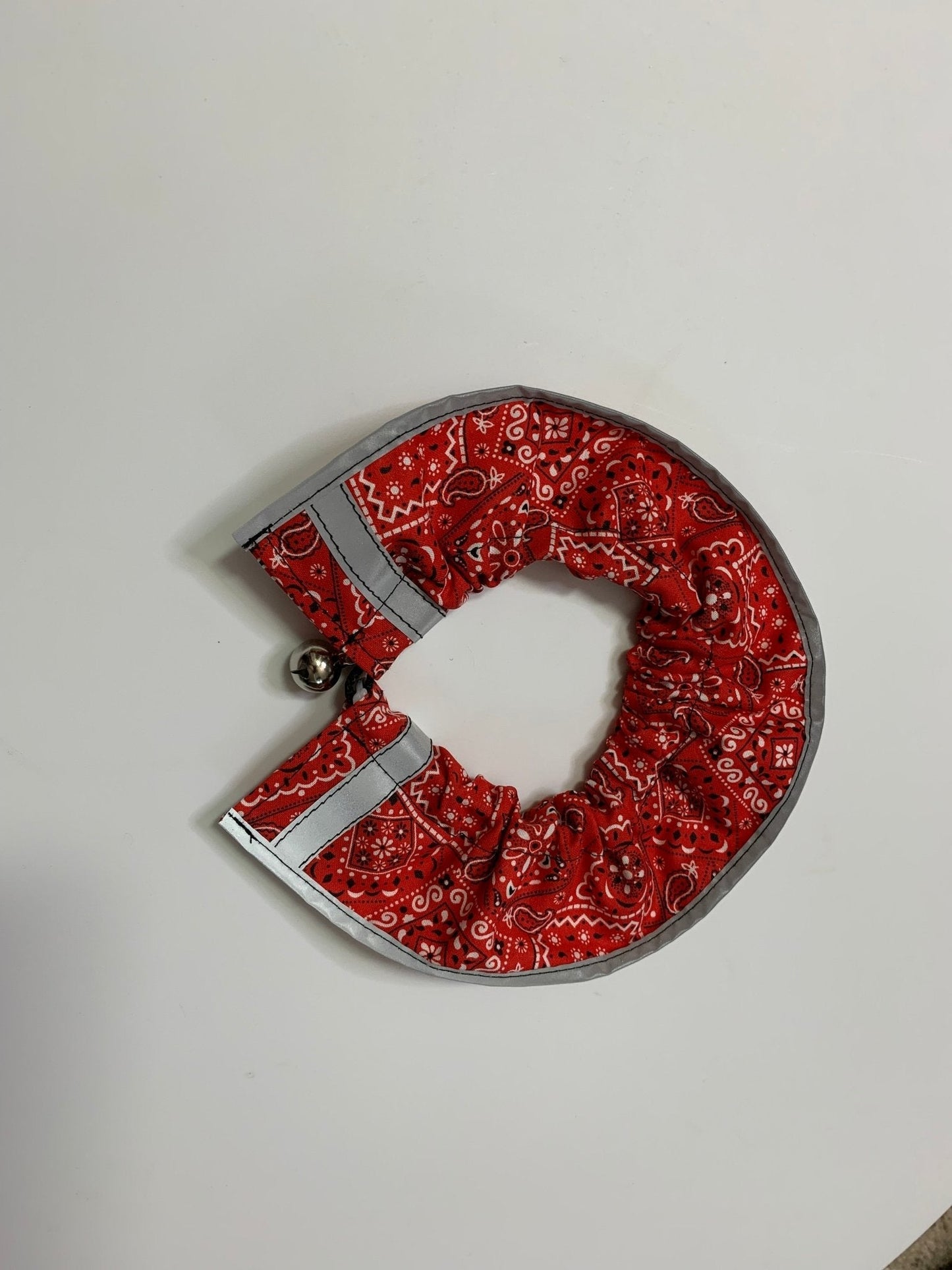 Red Prey Saver breakaway cat collar with bandana by Crazy K Farm Pet and Poultry, designed for safety and style.