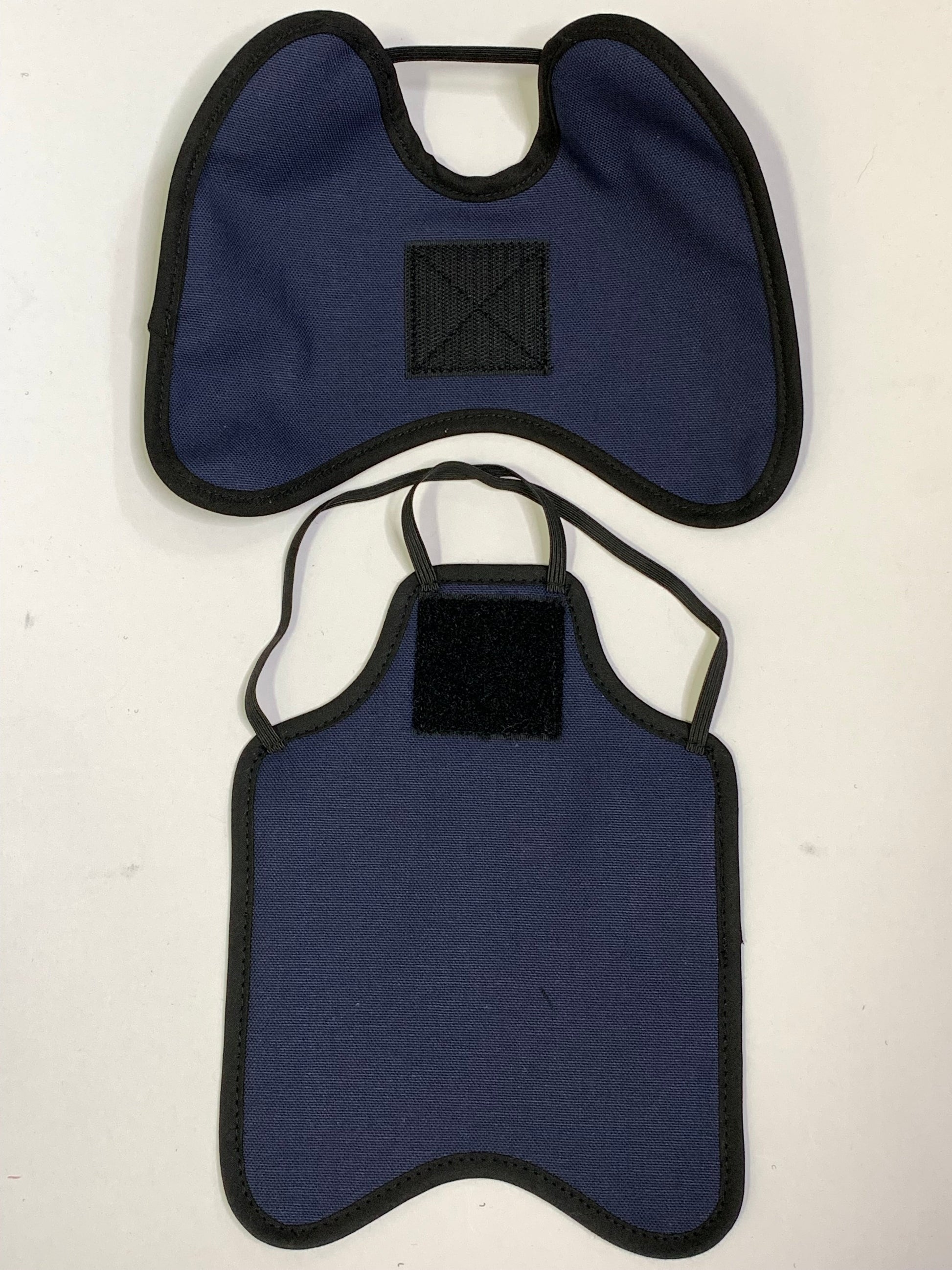 Navy hen apron with shoulder protectors for chickens, made by Crazy K Farm Pet and Poultry, designed to protect hens' backs.