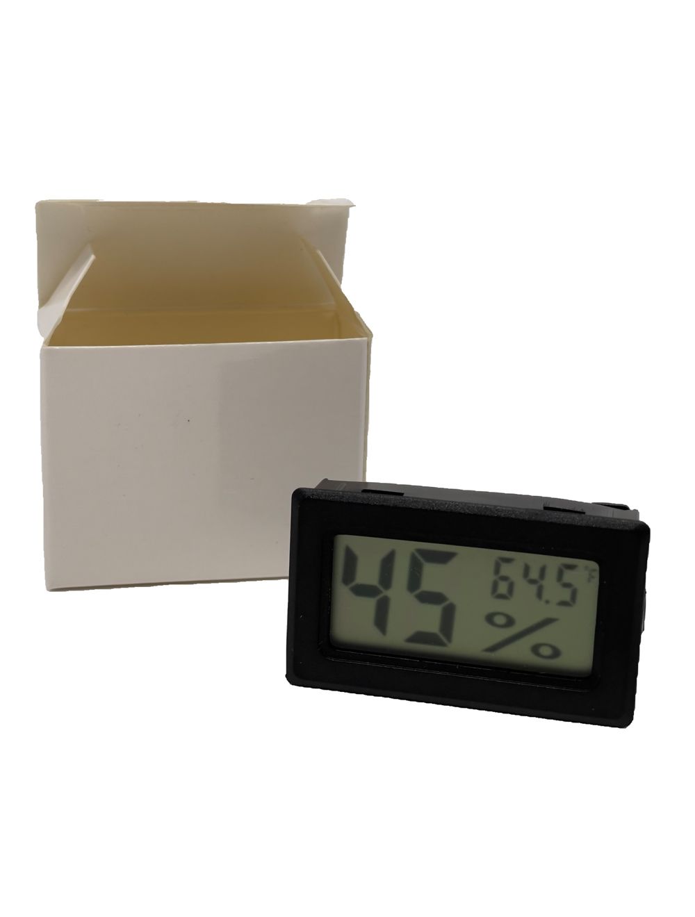 CrownBees humidity and temperature gauge showing dial with humidity and temperature readings in a natural setting