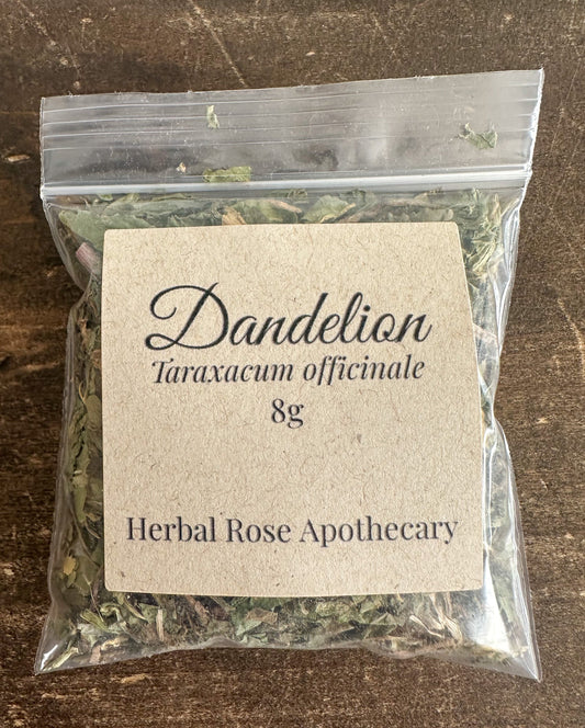 Dried dandelion herbs in an 8g package from Herbal Rose Apothecary, showing yellow flowers and green leaves.