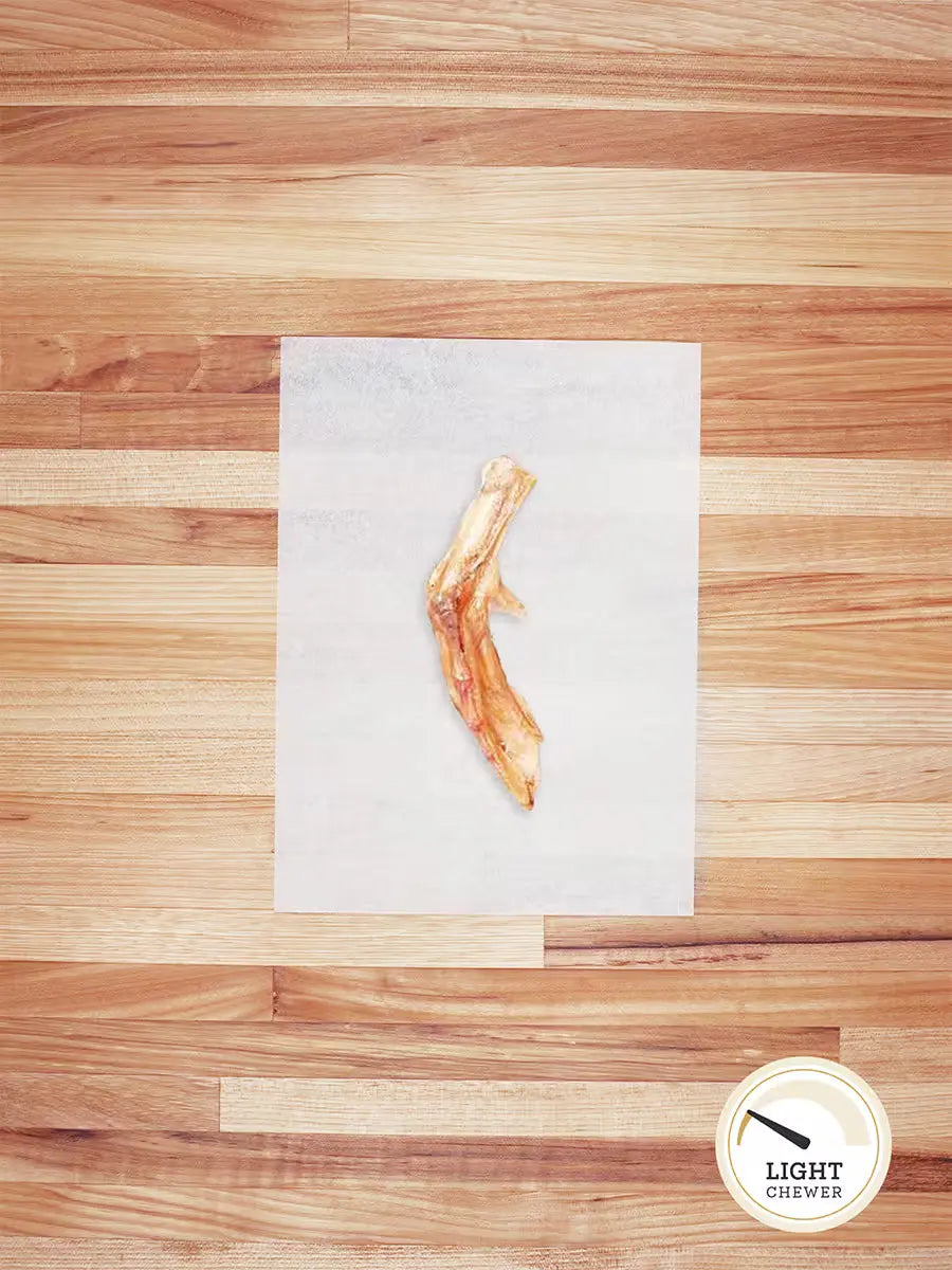 Farm Hounds duck feet chews for dogs, natural and crunchy duck foot treats with visible textured skin and meat.