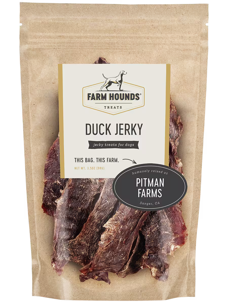 Front view of Farm Hounds duck jerky, natural dried duck meat snack with textured surface and visible strips of jerky.