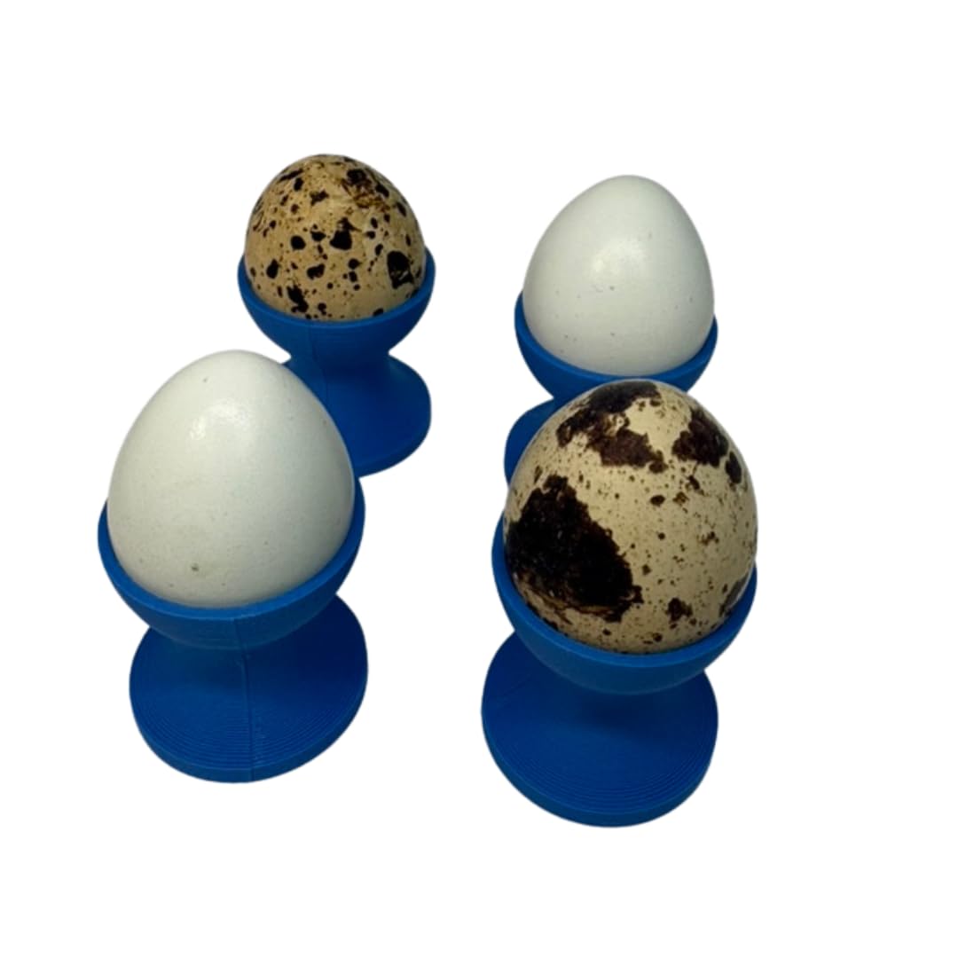 Set of four Quailz.com mini egg cups for quail eggs, featuring small, stylish holders for serving and display.