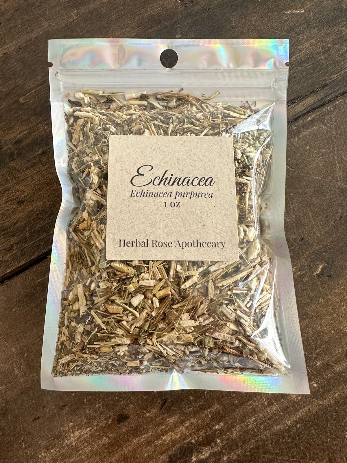Dried Echinacea Herb roots in a 1oz package from HerbalRoseApothecary, showing the earthy, textured roots used for herbal remedies.