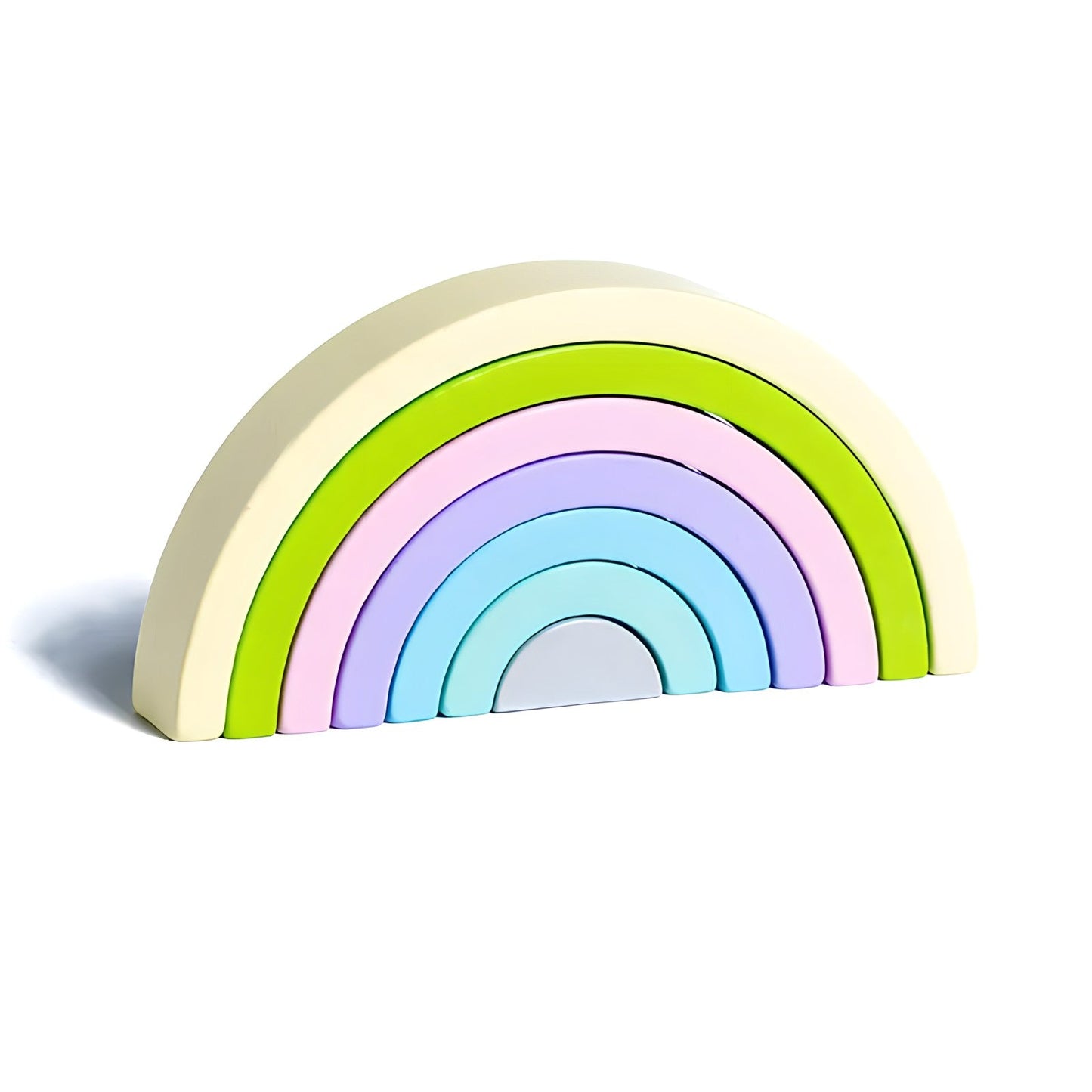 Small wooden rainbow arch blocks by Petite Pioneers, colorful and smooth toy for children, arranged in a playful display.