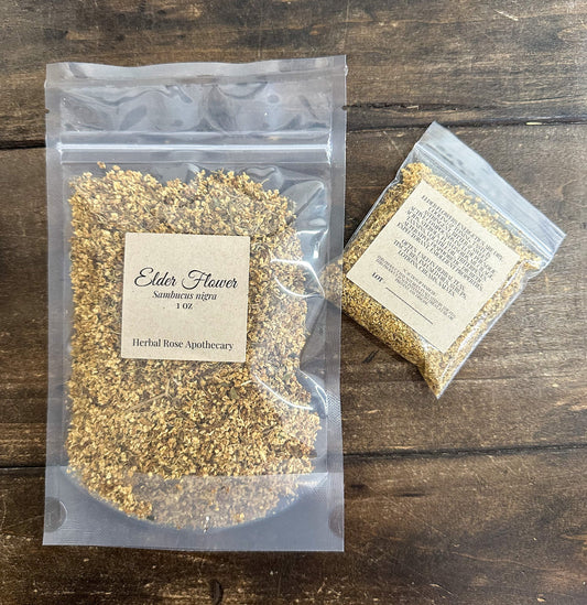 Dried elderflowers from HerbalRoseApothecary, showcasing clusters of small white flowers used in herbal remedies and teas.