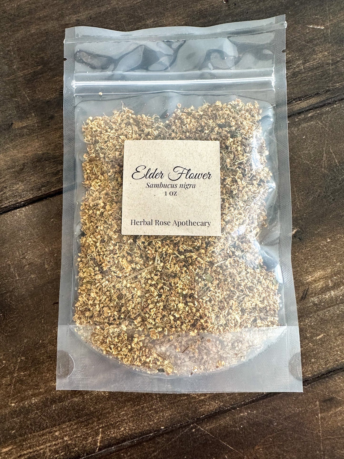 Dried elderflowers from herbalroseapothecary, 1 oz, showcasing delicate white elderflower blossoms for herbal remedies and teas.