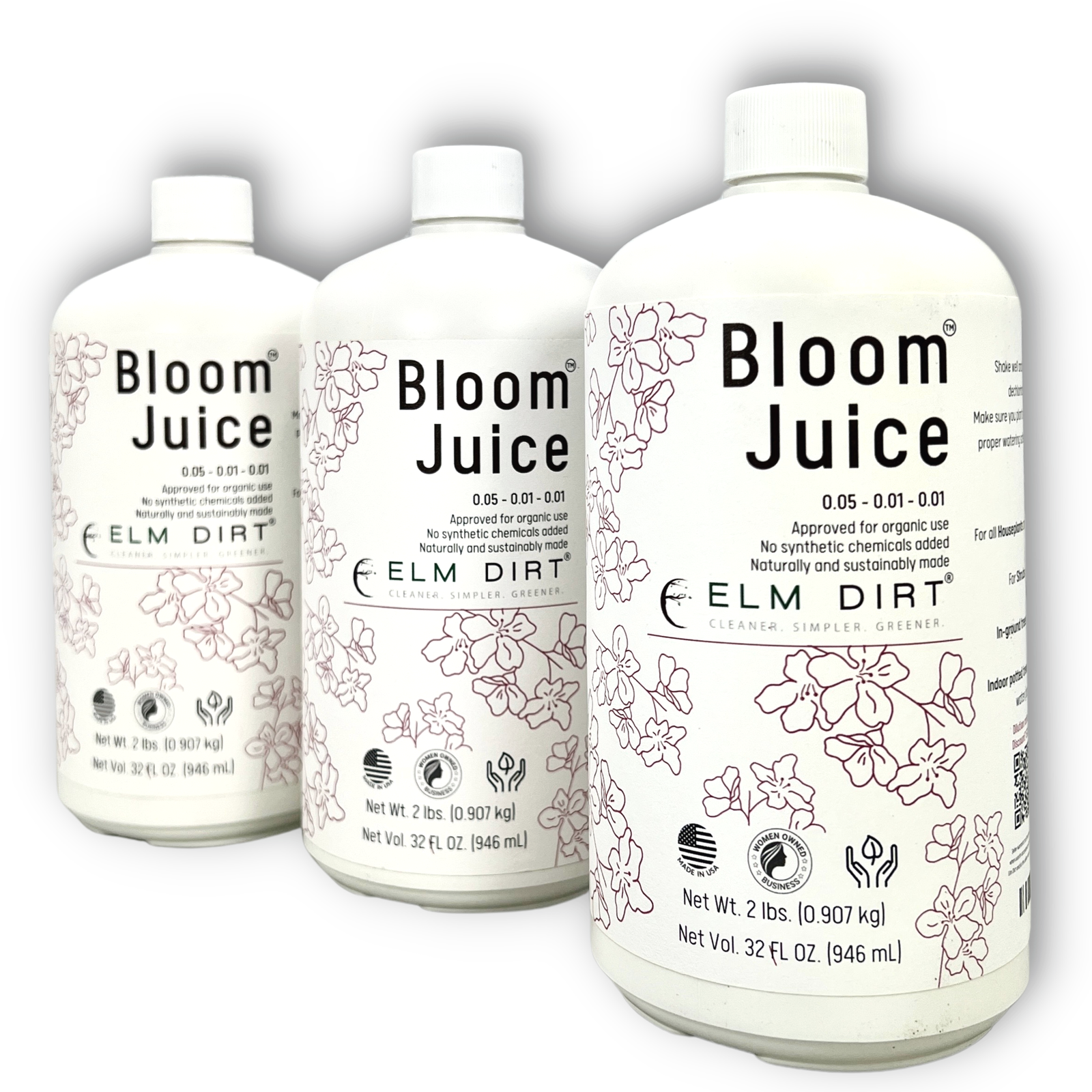 Three white bottles of Bloom Juice by Elm Dirt, each 32 oz (946 mL) and labeled organic, feature floral line art and black text. Ideal for blooming plants; contains no synthetic chemicals.
