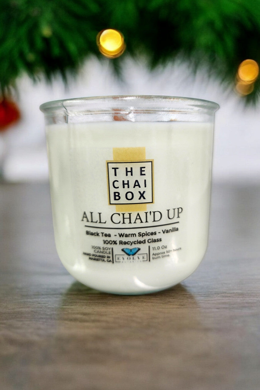 Evolve Botanica Rocks Candle Chai with wood wick and gemstone, soy wax, resembling a large decorative candle for cozy ambiance.