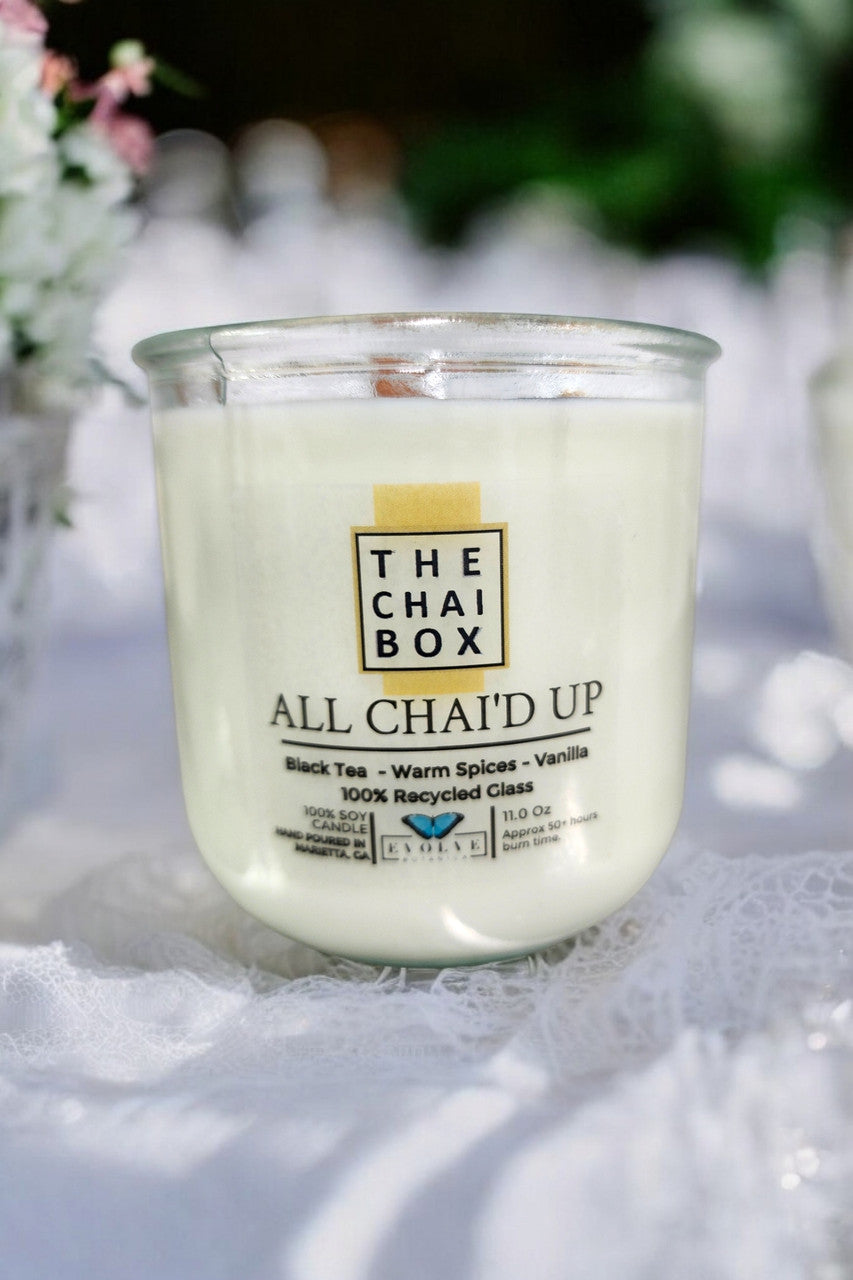 Evolve Botanica Rocks Candle Chai with wood wick and gemstone, soy wax, showcasing a warm, decorative candle design.