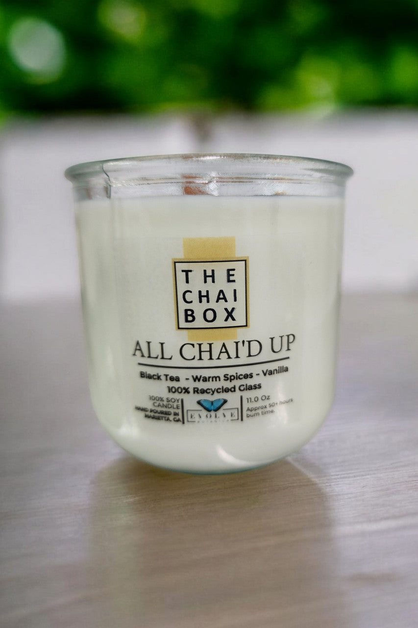 Evolve Botanica Rocks Candle Chai with wood wick and gemstone, soy wax, showcasing a warm, cozy candle design.