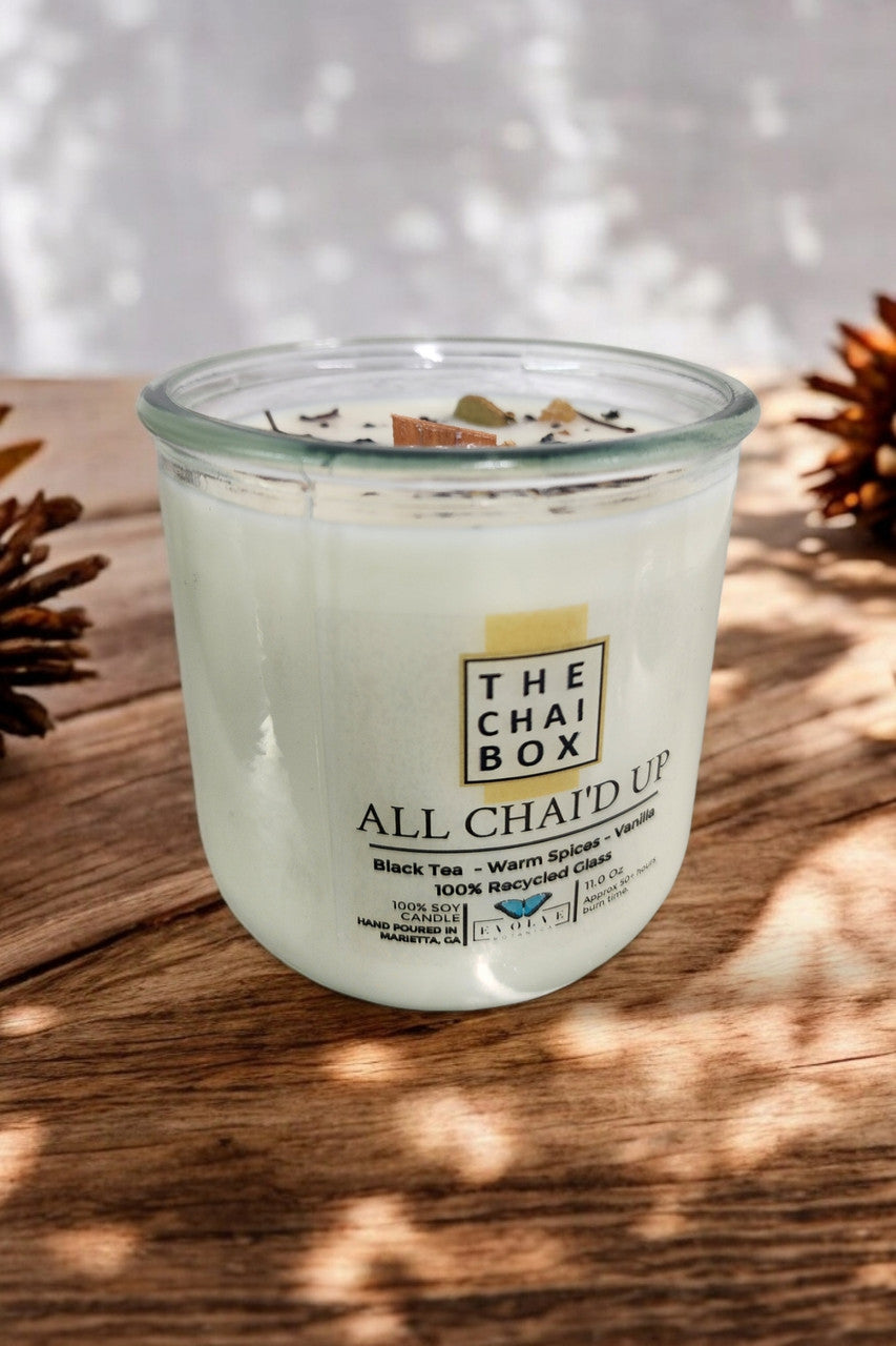 Evolve Botanica Rocks Candle Chai with wood wick and gemstone accents, soy wax for a calming, natural ambiance.