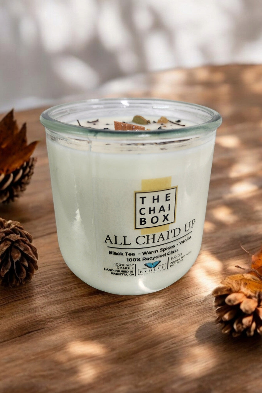Evolve Botanica Rocks Candle Chai with wood wick and gemstone, soy wax, showcasing warm candle with gemstone accents.