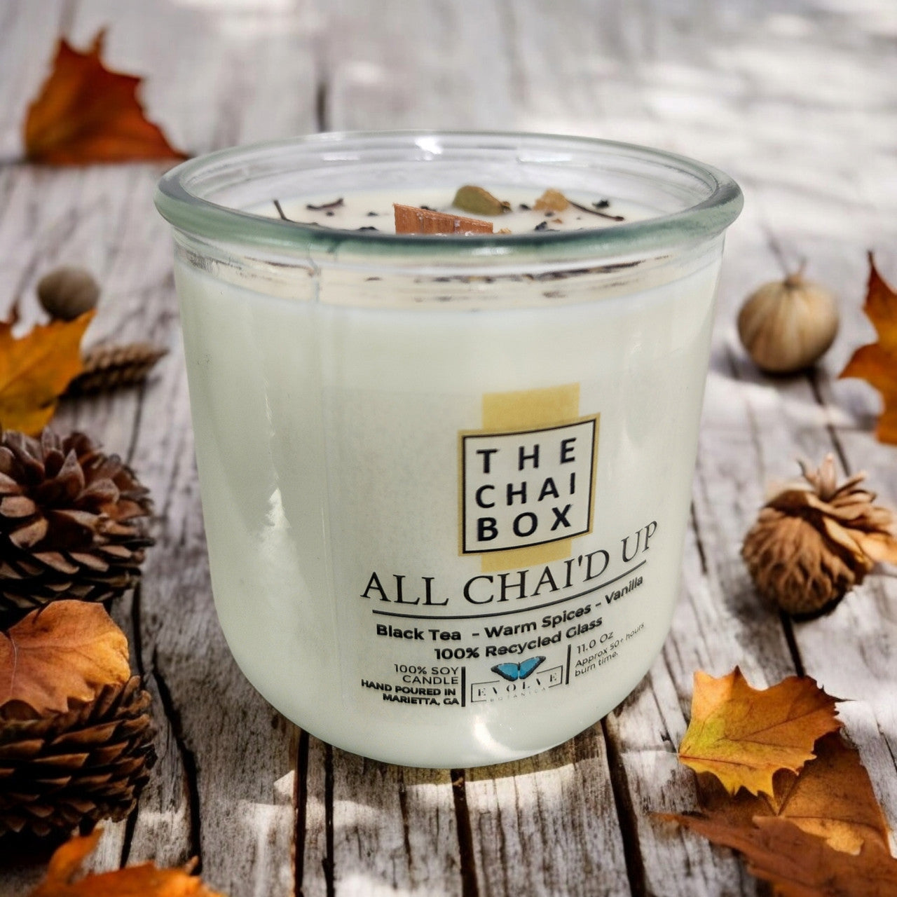 Evolve Botanica Rocks Candle Chai with wood wick, gemstone accents, soy wax, elegant and cozy for ambient lighting and decor.
