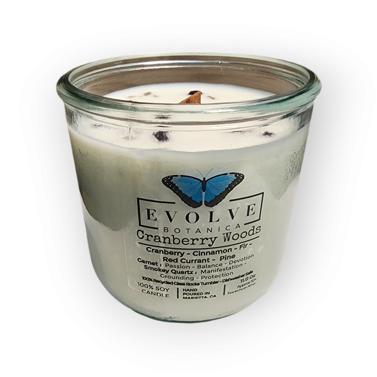 Evolve Botanica Rocks Candle Cranberry Woods with wood wick, garnet and smokey quartz gemstones, soy wax, cozy and decorative.