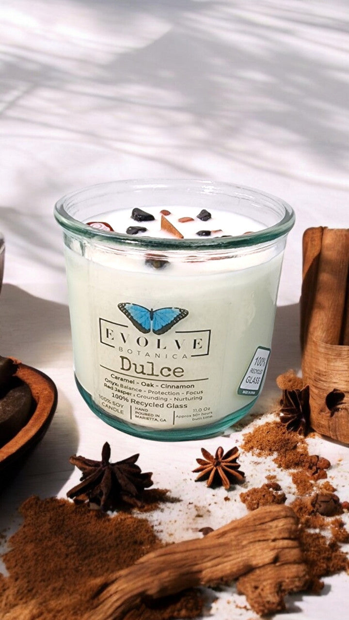 Evolve Botanica Rocks Candle Dulce with wood wick, red jasper and onyx gemstones, soy wax, and a calming aesthetic.