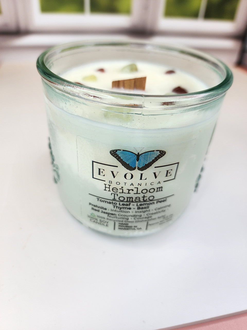Evolve Botanica Rocks Candle in Heirloom Tomato with wood wick, prehnite, red jasper, soy wax, natural candle for relaxation.
