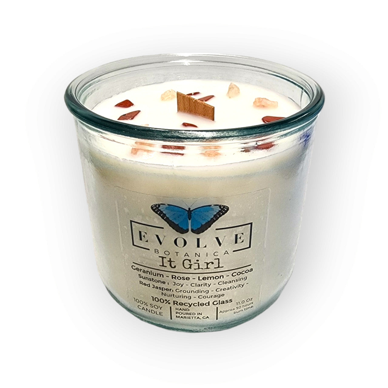 Evolve Botanica Rocks Candle It Girl with wood wick, sunstone, and red jasper gemstones in a soy candle.