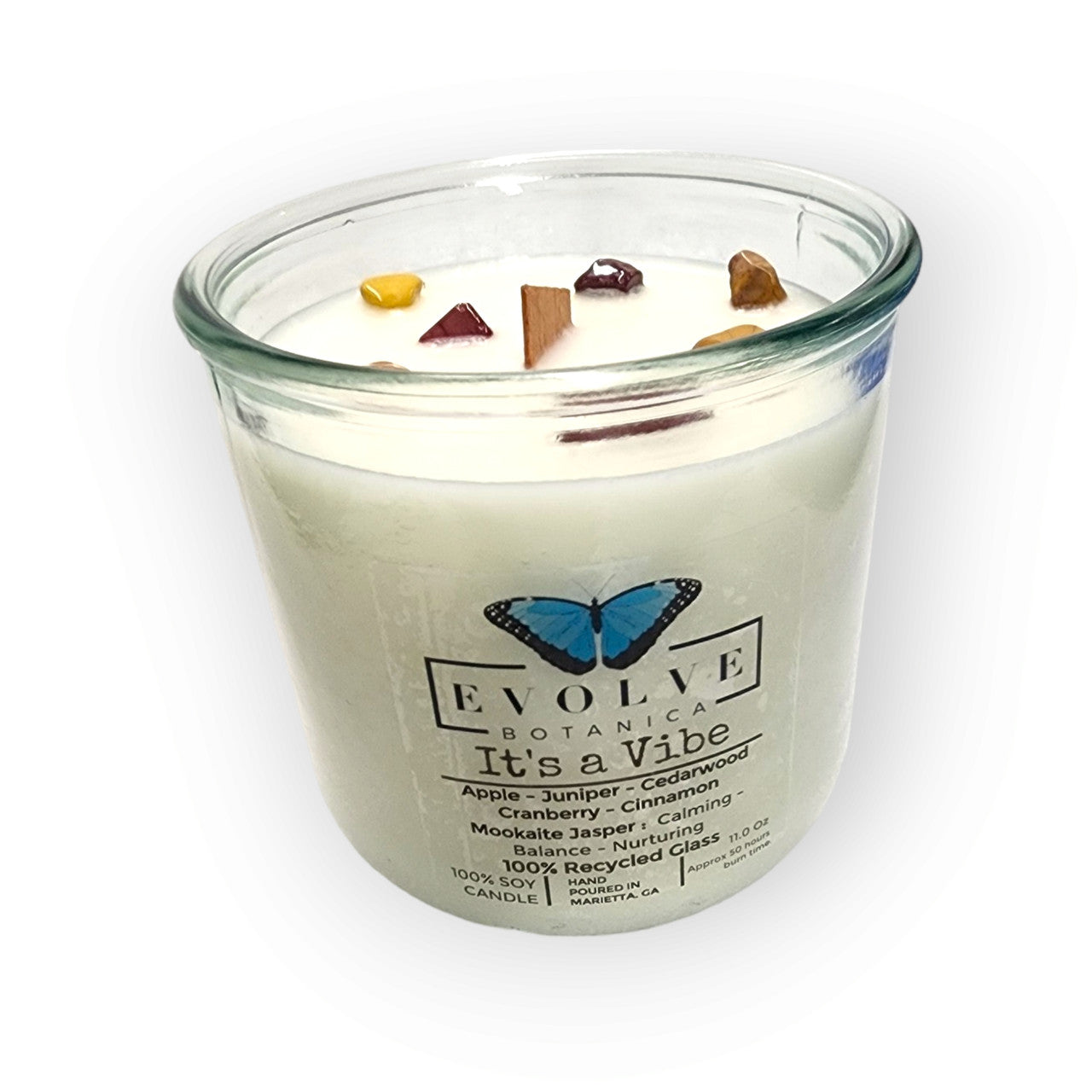Evolve Botanica Rocks Candle It's a Vibe with wood wick, Mookite Jasper gemstone, soy wax, and natural earthy design.