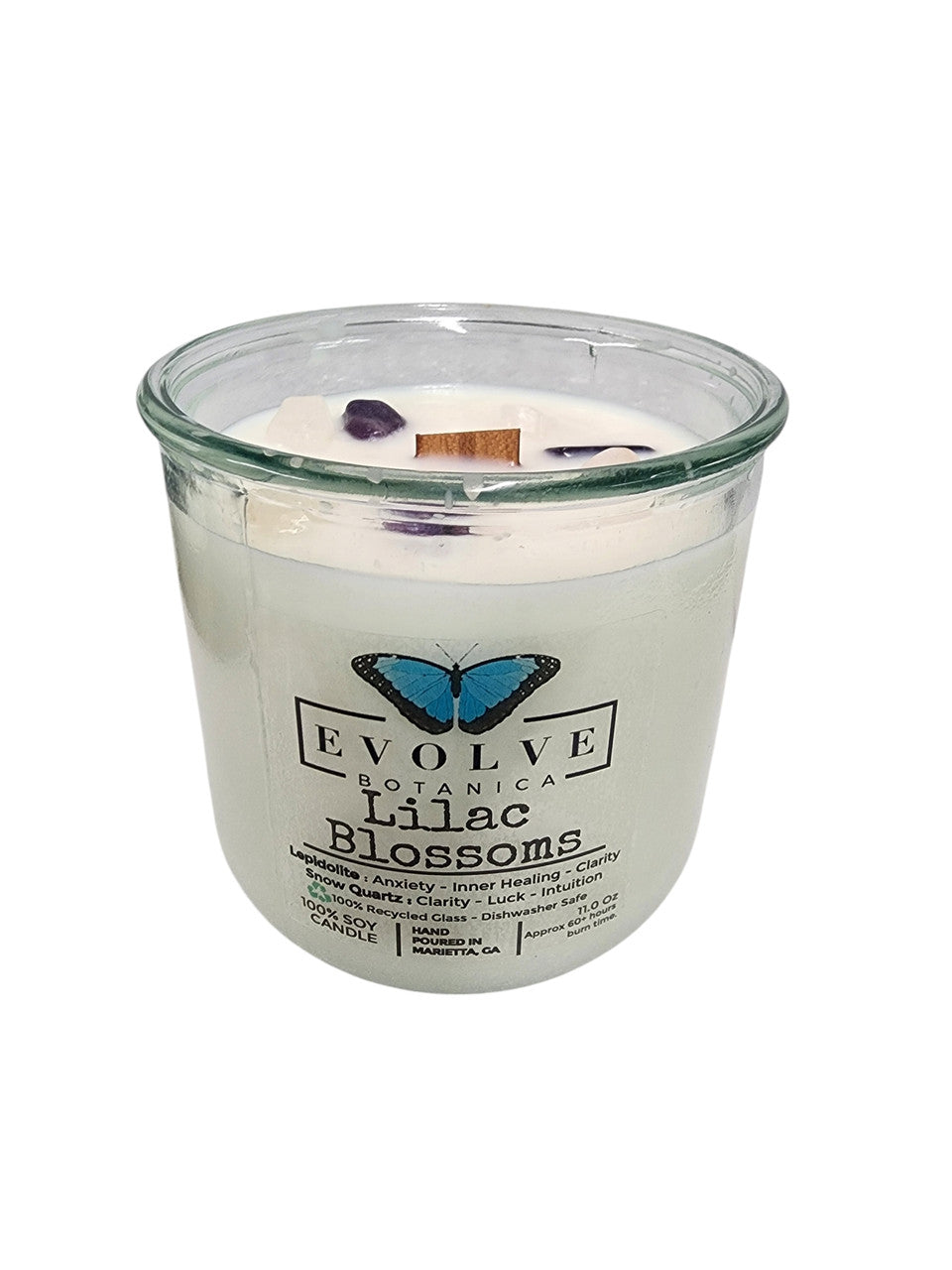 Evolve Botanica Rocks Candle Lilac Blossoms with wood wick and Lepidolite gemstone, soy wax, floral scented candle on a white background.