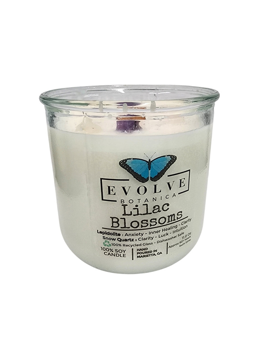 Evolve Botanica Rocks Candle Lilac Blossoms with wood wick, lepidolite gemstone, soy wax, in a glass jar.