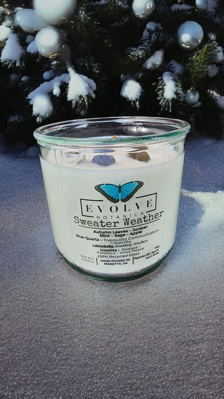 Evolve Botanica Rocks Candle Sweater Weather with wood wick, howlite, labradorite, and sodalite crystals in a soy candle.