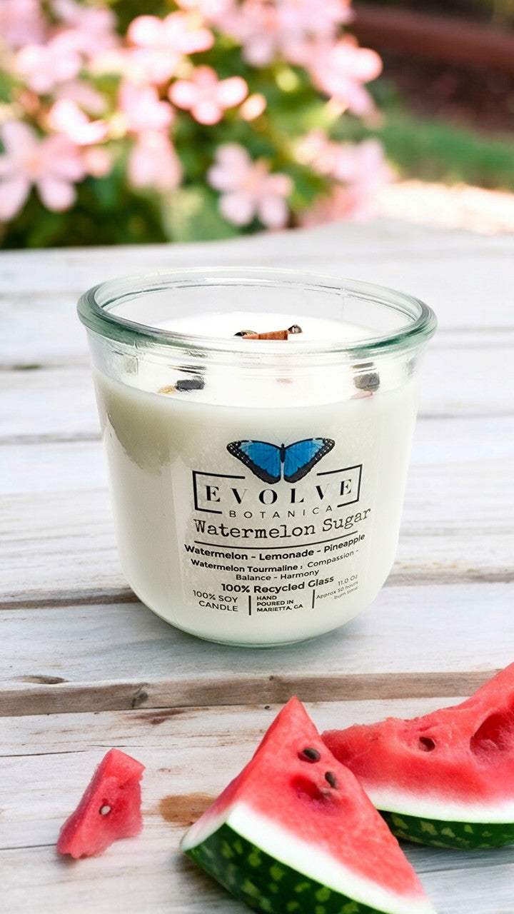 Evolve Botanica Watermelon Sugar Rocks Candle with wood wick and gemstone accents, soy wax, vibrant watermelon scent.
