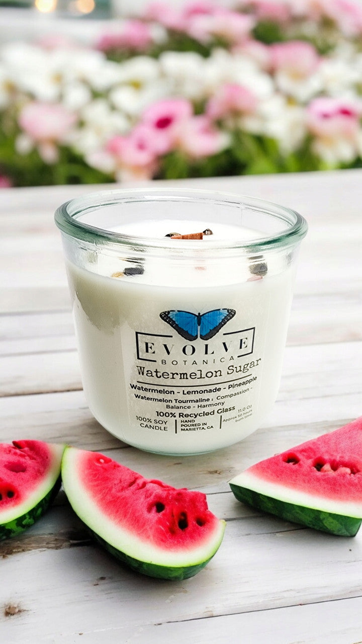 Evolve Botanica Watermelon Sugar Rocks Candle with wood wick and gemstone accents, soy wax, vibrant watermelon scent.