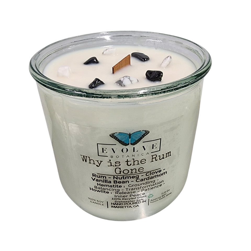 Evolve Botanica Rocks Candle with wood wick, hematite, and howlite stones for grounding, balance, and inner peace.