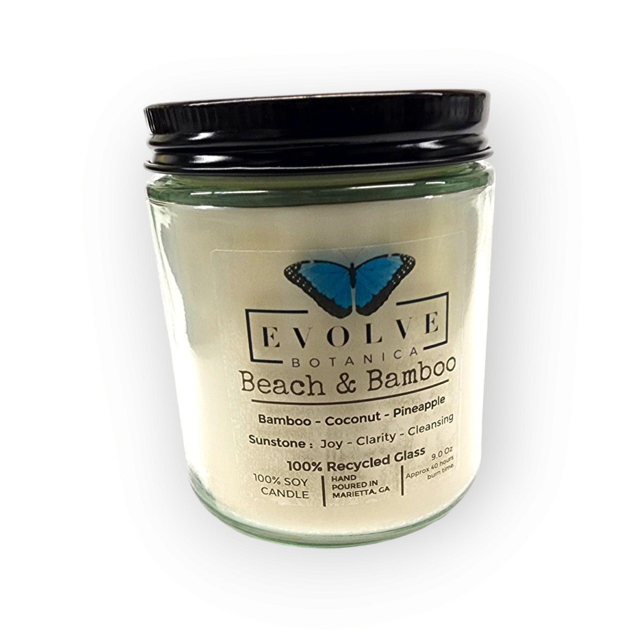 Evolve Botanica Classic 9oz Jam Jar Crystal Soy Candle with Beach & Bamboo scent, natural wood wick, sunstone aroma, in a clear glass jar.