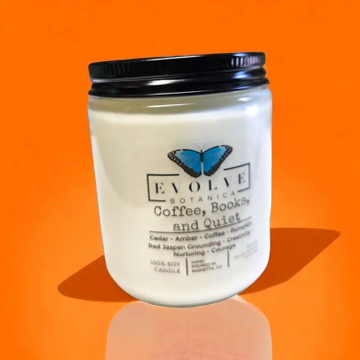 Evolve Botanica Classic 9oz jam jar crystal soy candle with coffee and book scent, natural wood wick, relaxing home decor.