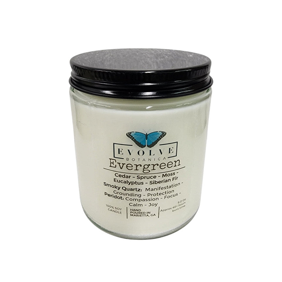 Evolve Botanica 9oz Jam Jar soy candle with evergreen scent, smoky quartz, and peridot crystals, natural wood wick.
