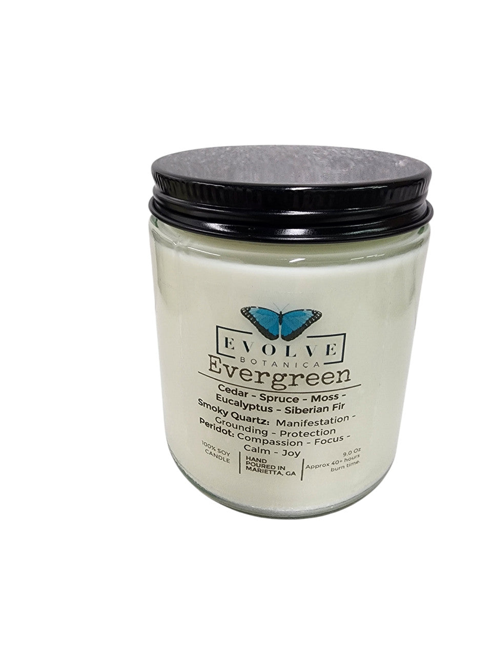 Evolve Botanica 9oz jam jar soy candle with evergreen scent, smoky quartz, and peridot crystals, natural wood wick.