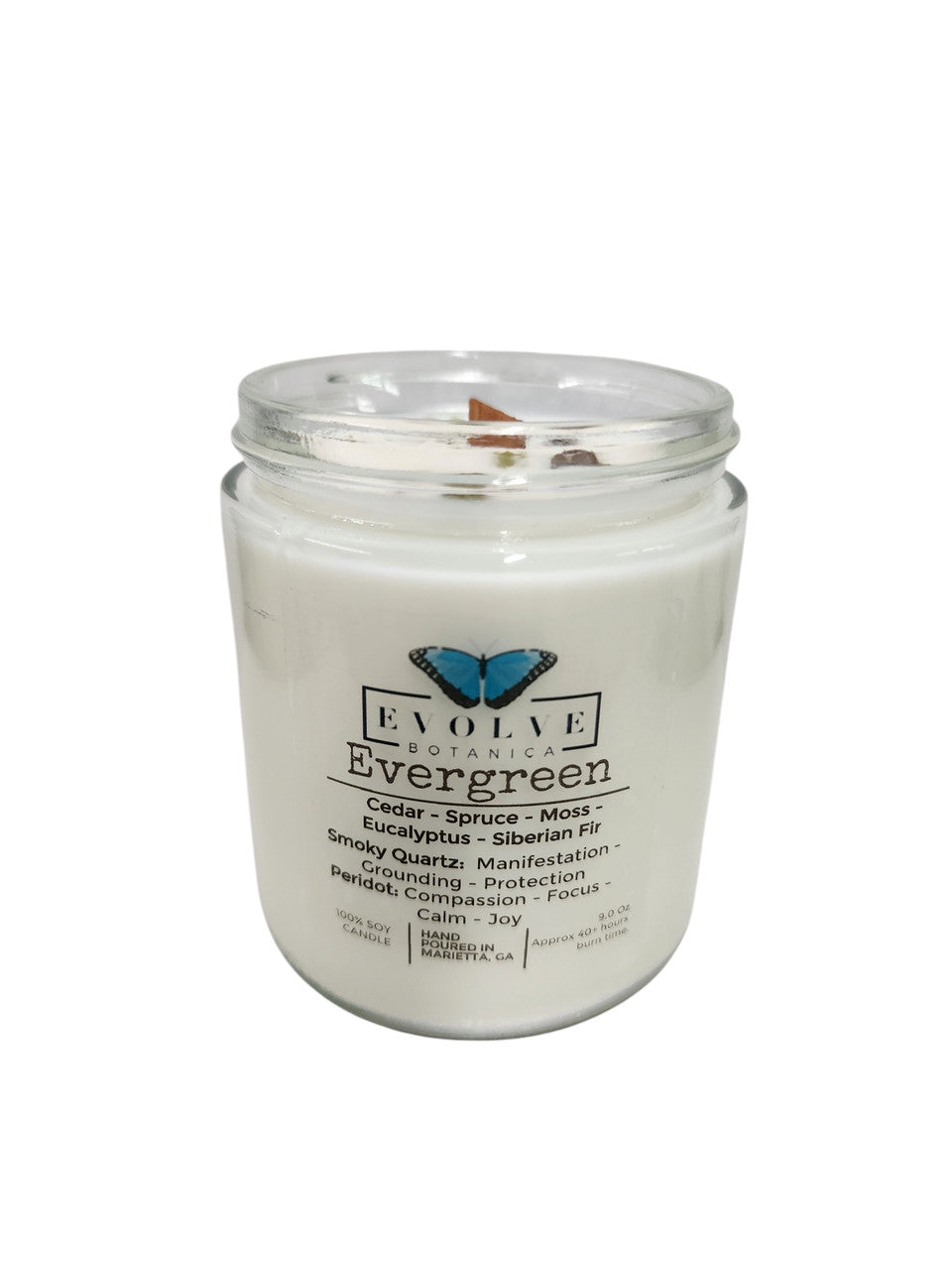 Evolve Botanica 9oz jam jar soy candle with evergreen scent, crystal accents of smoky quartz and peridot, natural wood wick.