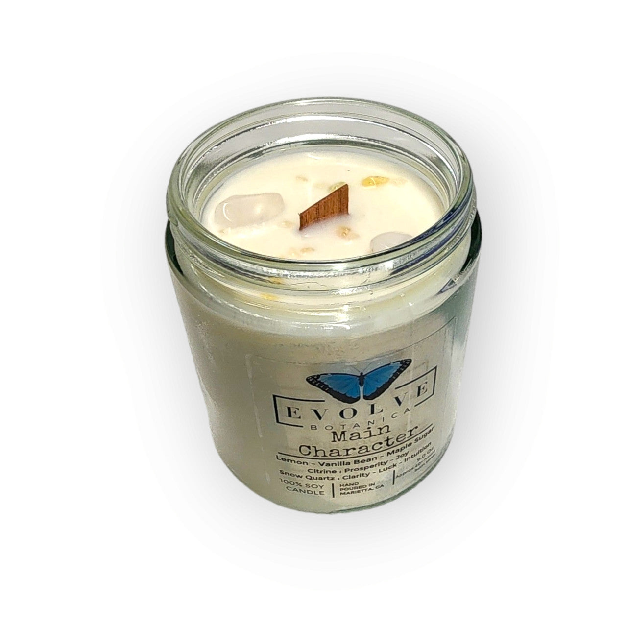 Evolve Botanica Classic 9oz jam jar soy candle with citrine and snow quartz crystals, natural wood wick, and elegant design.