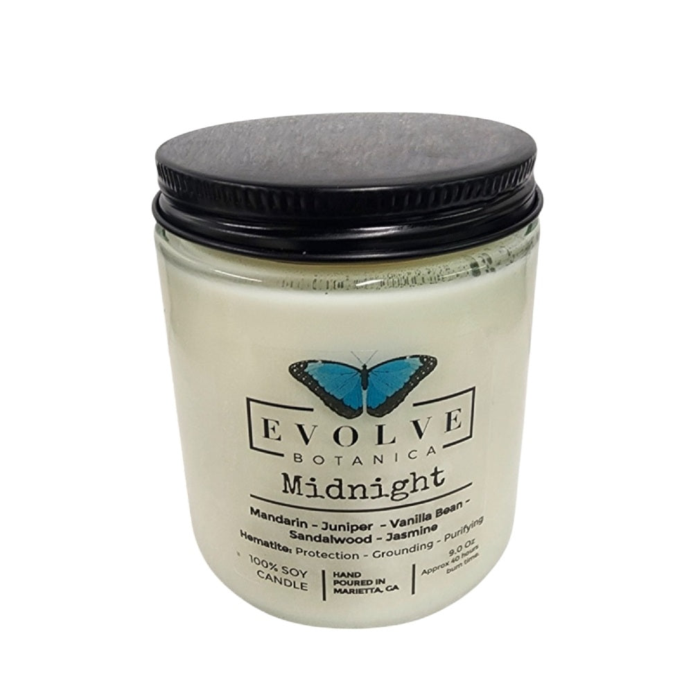 Evolve Botanica 9oz jam jar soy candle with natural wood wick, Midnight Super Seven scent, clear glass container.