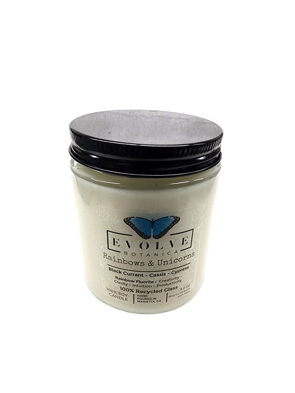 Evolve Botanica 9oz jam jar soy candle with rainbows, unicorns design, featuring a fluorite crystal accent and natural wood wick.