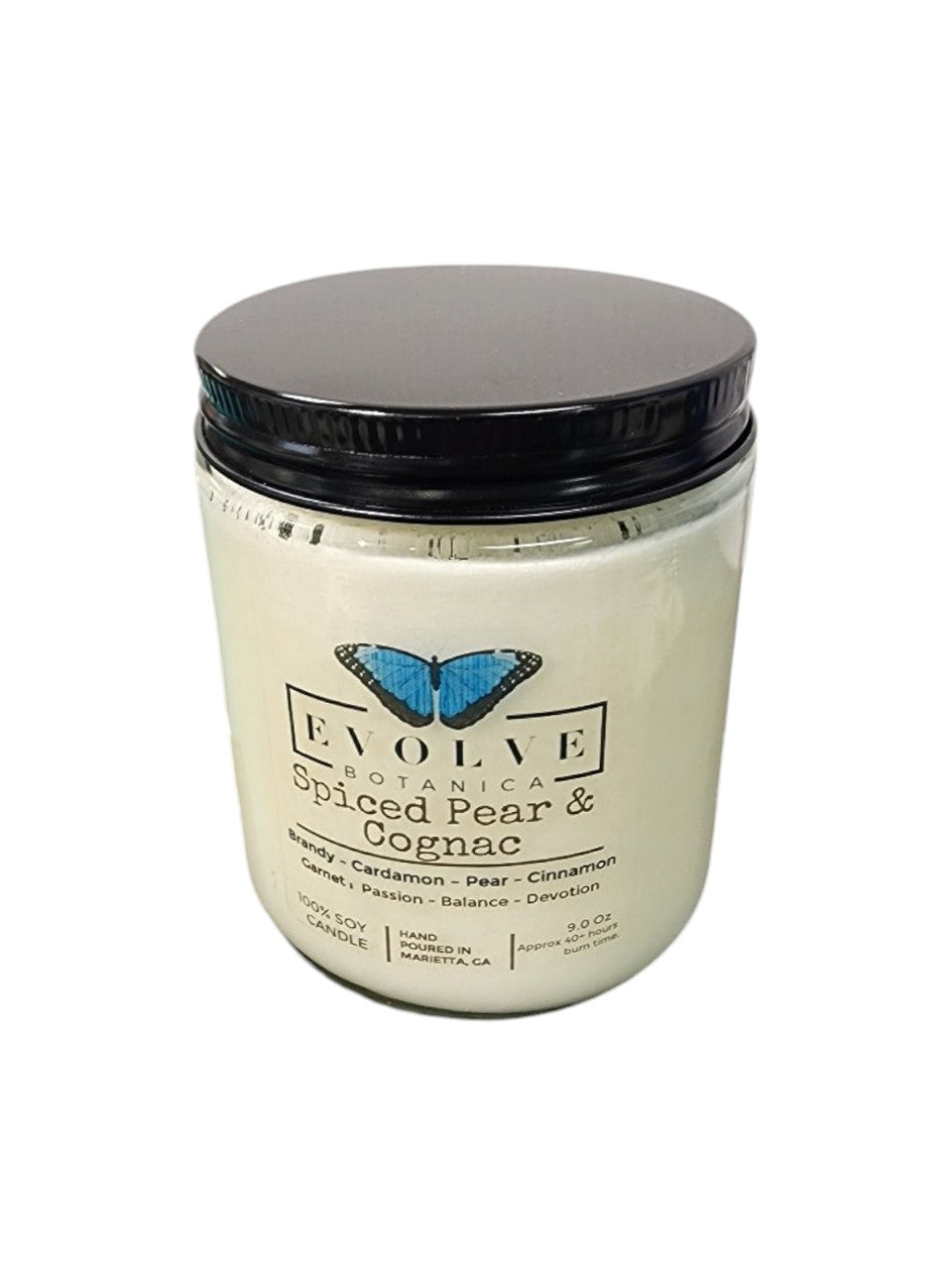 Evolve Botanica 9oz jam jar crystal soy candle with natural wood wick, Spiced Pear & Cognac scent in garnet color.