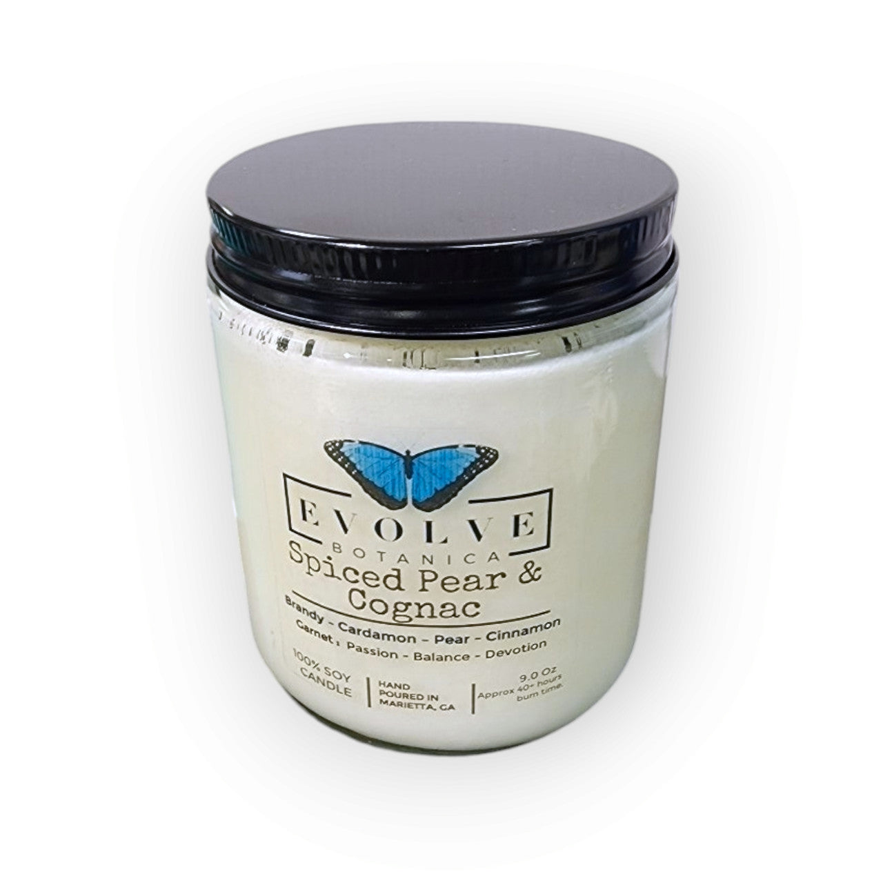 Evolve Botanica 9oz Jam Jar crystal soy candle with natural wood wick in Spiced Pear & Cognac scent, garnet-colored wax.