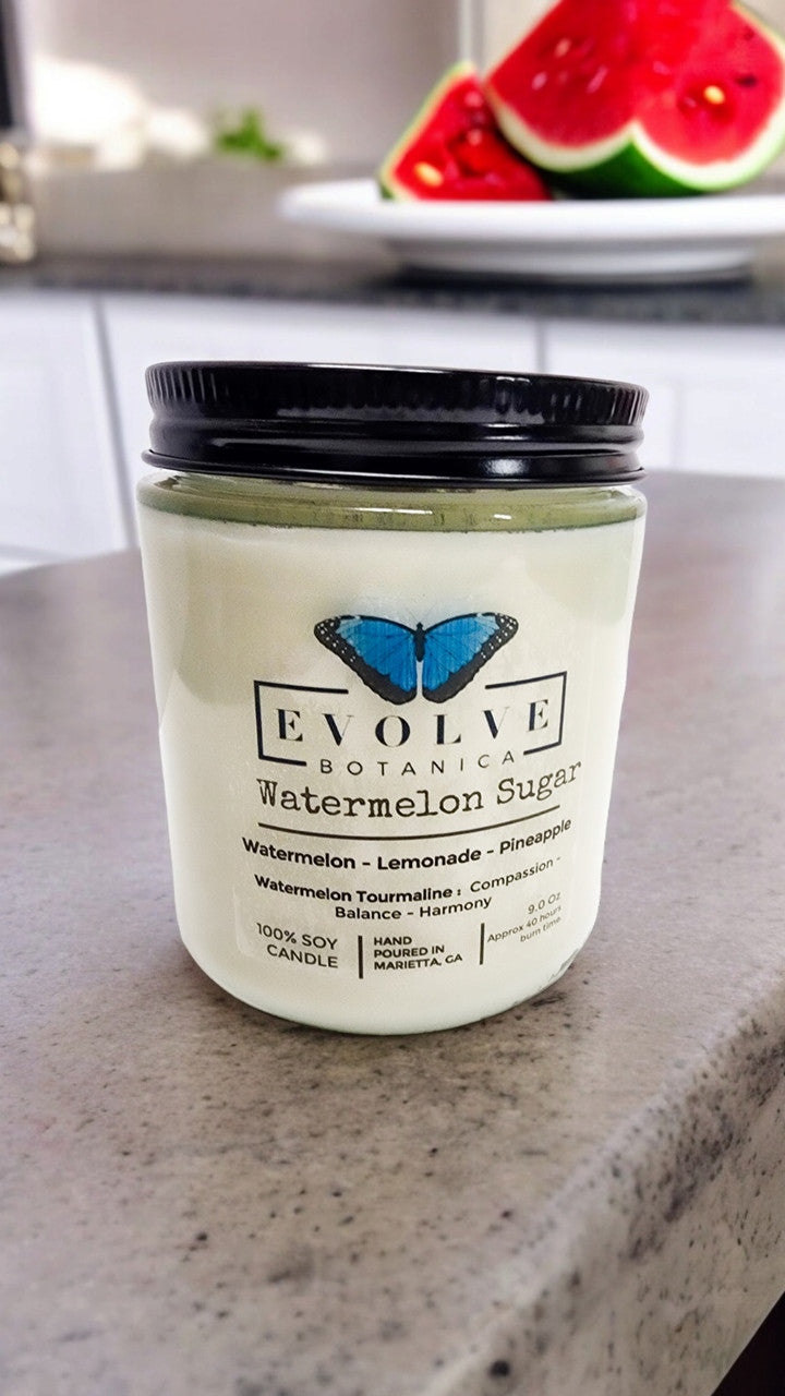Evolve Botanica Classic 9oz jam jar crystal soy candle with watermelony sugar scent and natural wood wick.