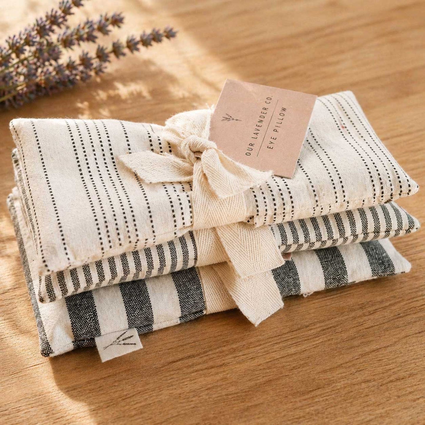 Lavender eye pillow from Our Lavender Co, heating and cooling pad with soft fabric, ideal for relaxation and soothing eye comfort.