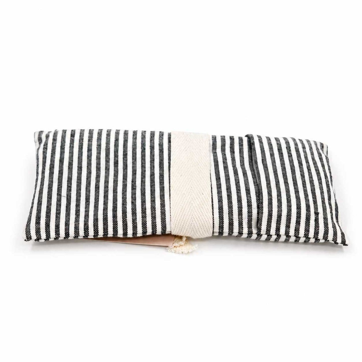 Lavender eye pillow from Our Lavender Co, heating and cooling pad with soft fabric, used for relaxation and eye comfort.