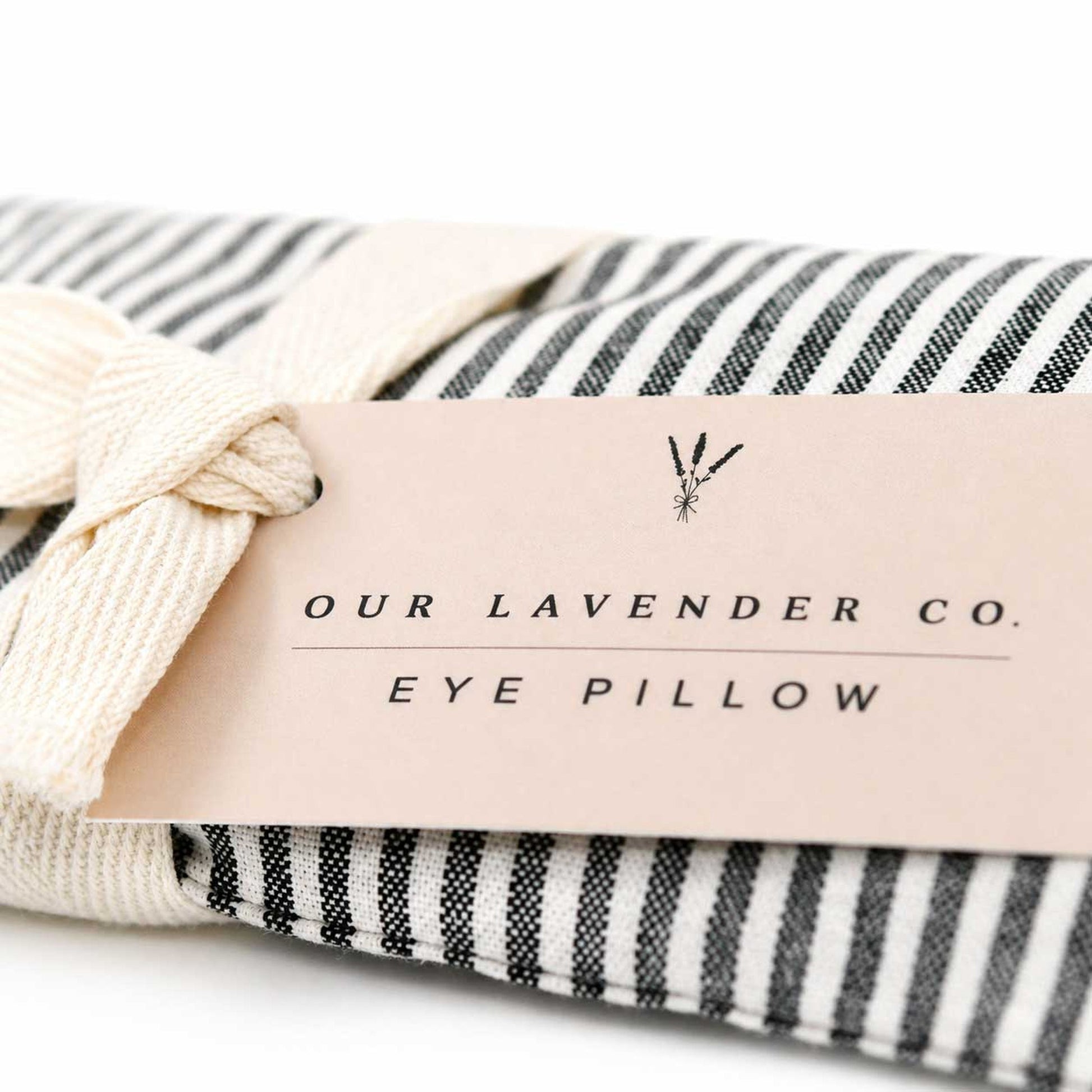 Lavender eye pillow from Our Lavender Co, heated or cooled, with soft fabric cover, used for relaxation and eye comfort.