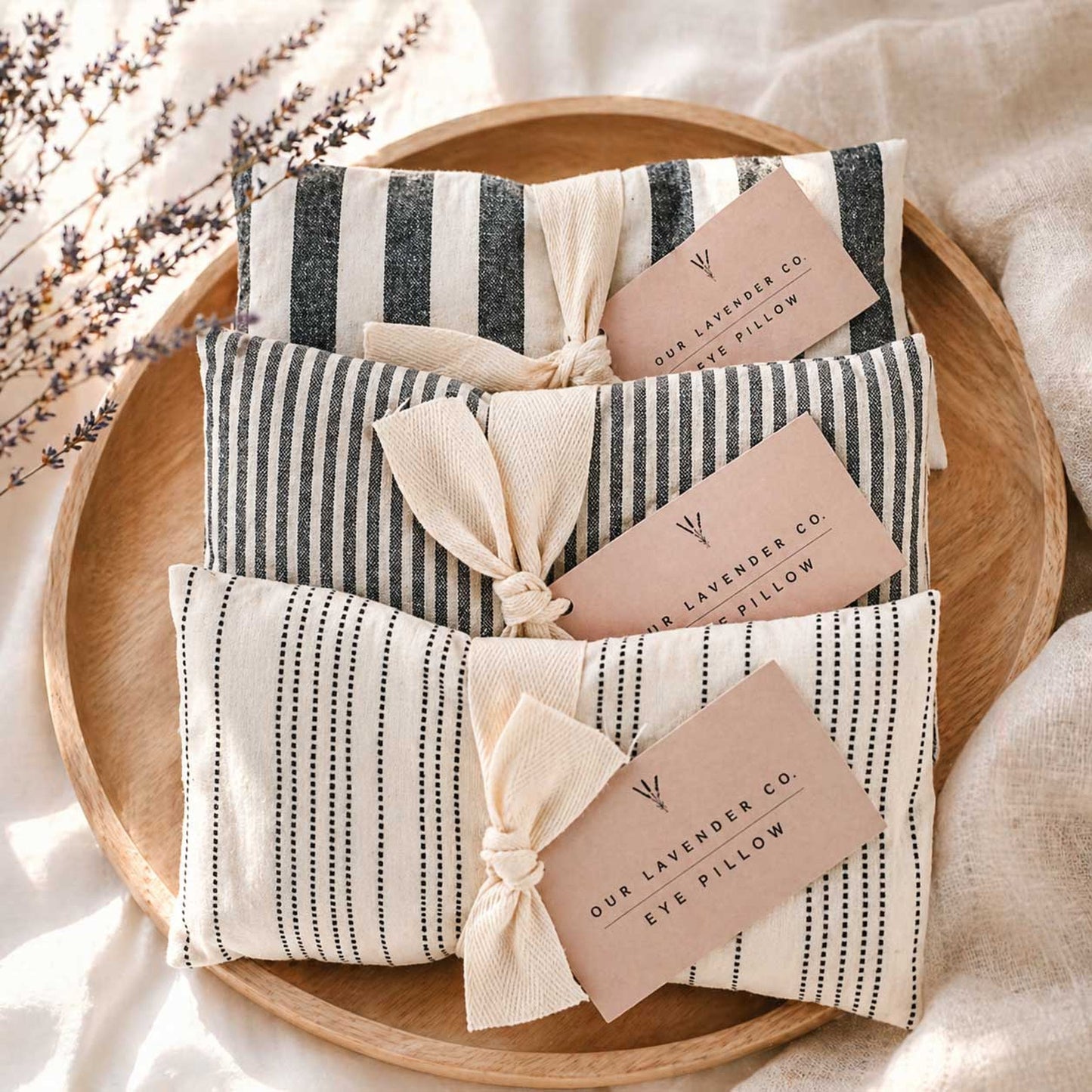 Lavender eye pillow from Our Lavender Co, heating and cooling pad with soft fabric for relaxation and soothing eye comfort.