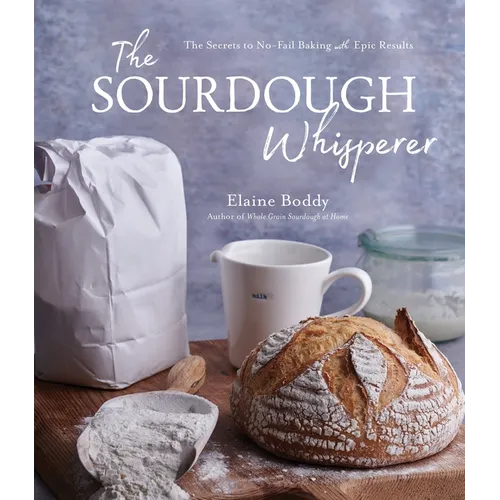 Paperback book titled "The Sourdough Whisperer" by splitShops, featuring a cover image with sourdough bread and baking tools.
