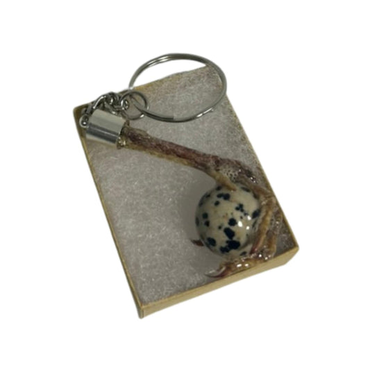 Quailz.com Quail Foot Keychain with faux quail egg stone, featuring detailed bird foot and decorative natural stone.