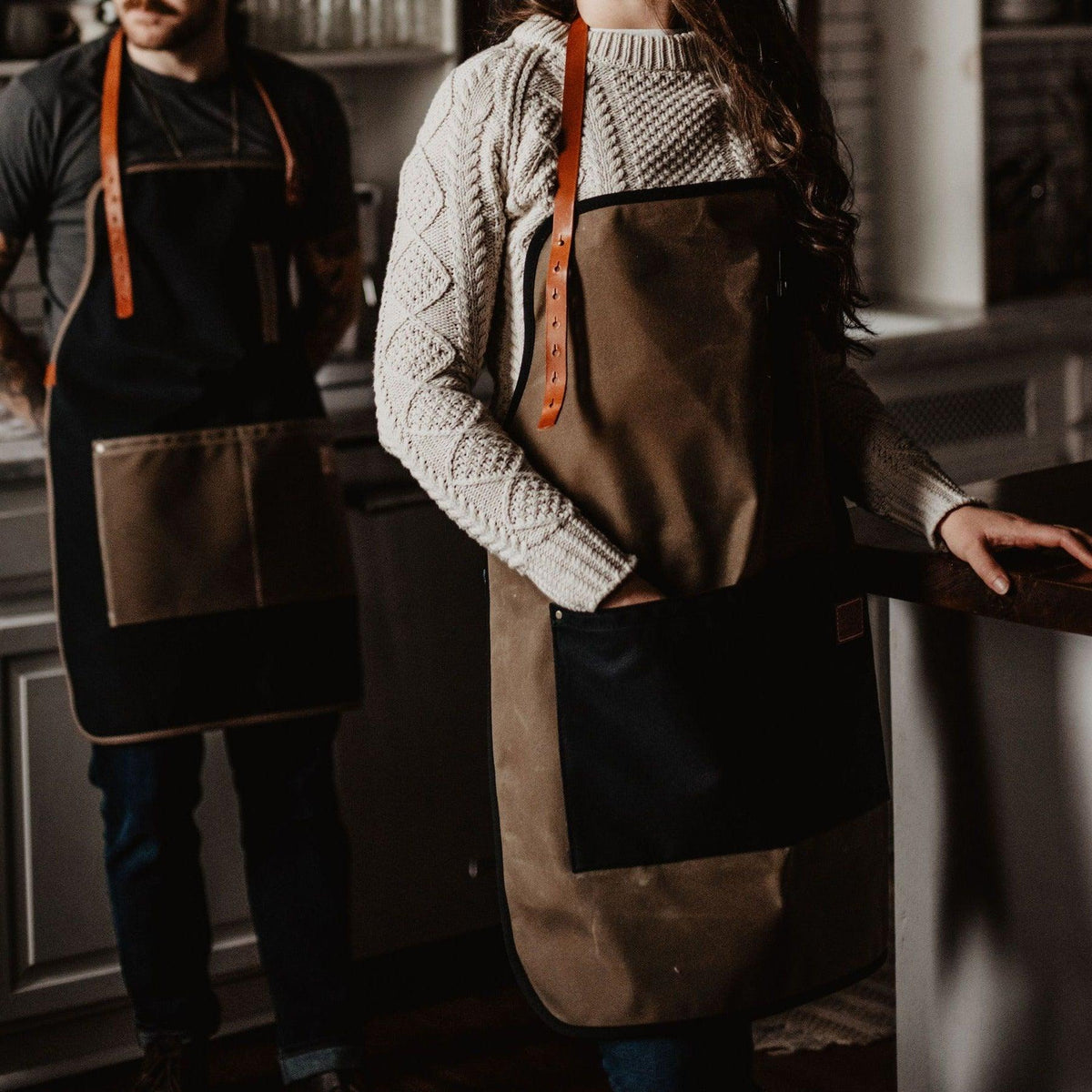 Waxed canvas apron by The Local Branch, USA made, featuring durable, weather-resistant material and adjustable straps.